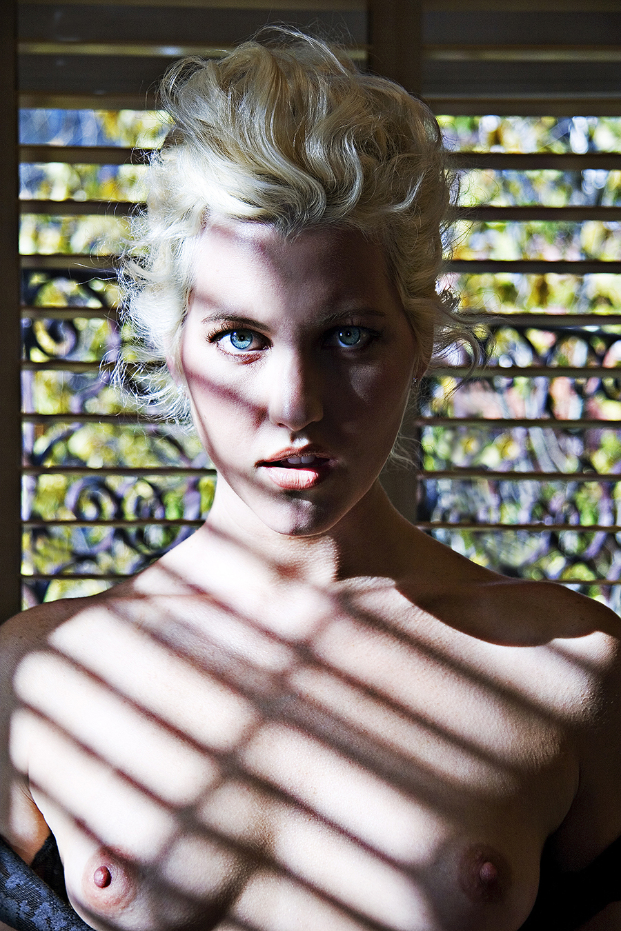 Tony_Ward_erotic_fashion_photography_blue_eyed_blonde_topless_chirascuro_light