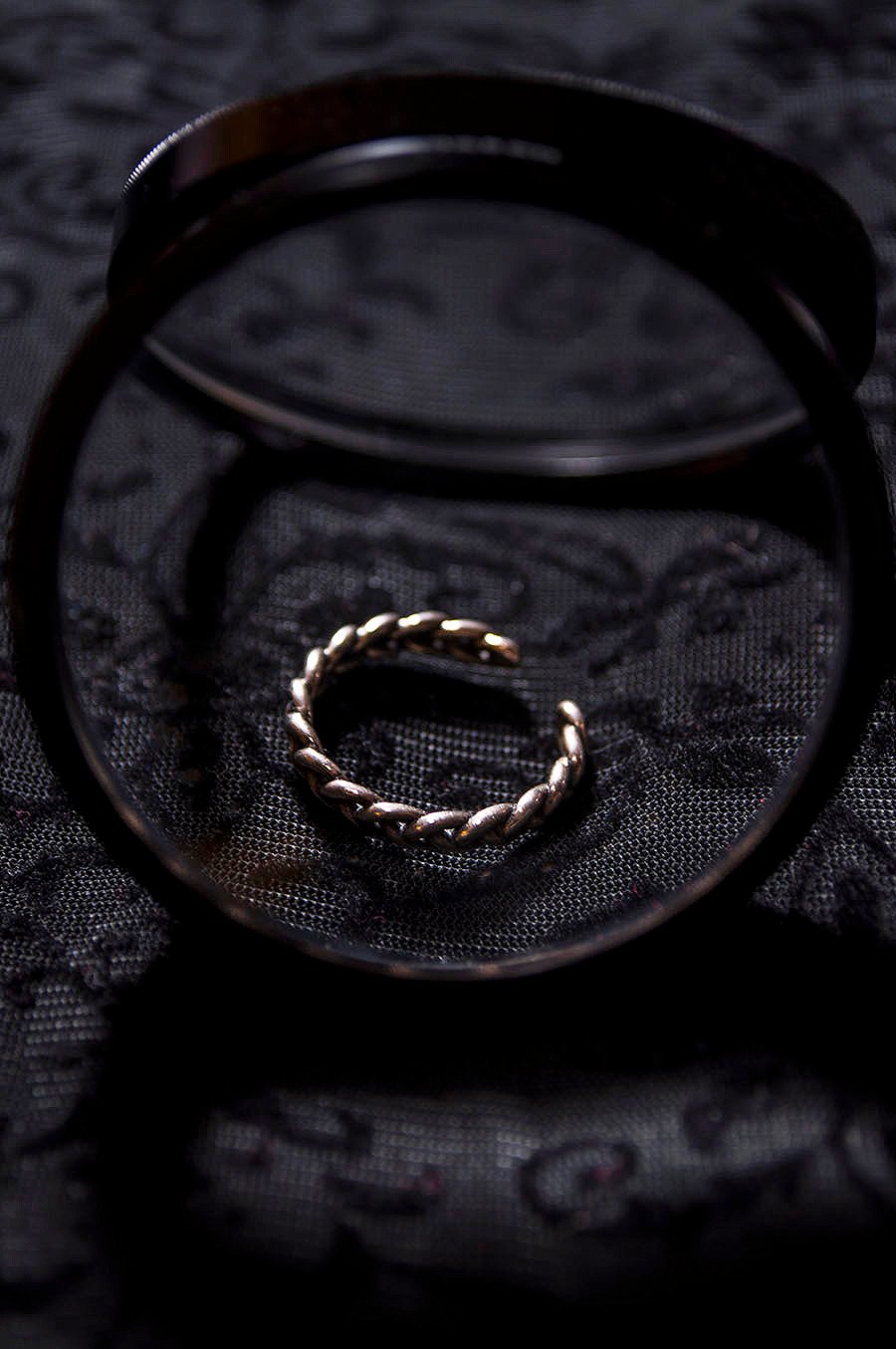 Rebecca_Huang_still_life_photography_dark_velvet_accessories_rings_jewelry_lens_magnifying_reflection_silver_braided_weaved_floral