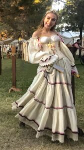 beautiful young woman dressed up like a princess wearing a corset