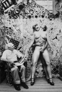 Asher Zagar looks on while couple performs sex act