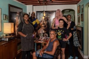Portrait of famous famous photographic artist Tony Ward with his crew at his studio in Elkins Park, Pa.