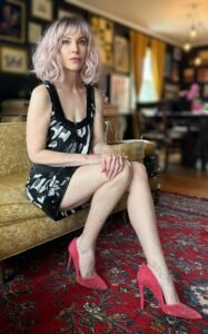 Adult performer Alex Foxe in her living room