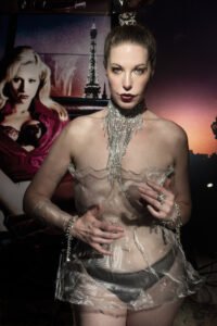 Kitchie Ohh photographed for Tony Ward's Vixen's series wearing KVaughn ALUMINUM WRAP DRESS