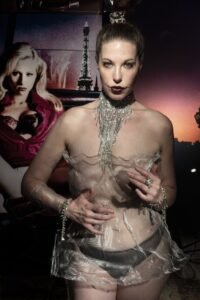 Kitchie Ohh photographed for Tony Ward's Vixen's series wearing KVaughn ALUMINUM WRAP DRESS