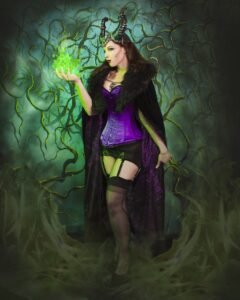 fetish model Kitchie Ohh wearing a purple corset for a fantasy scene